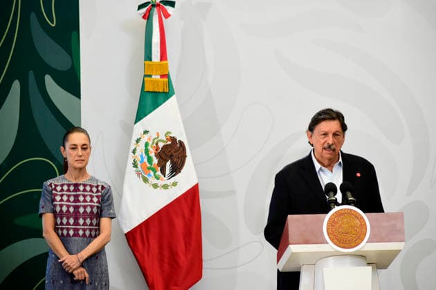 Mexican President Claudia Sheinbaum Holds International Workers Day Briefing Mexico™s President Claudia Sheinbaum Pardo is seen behind while the minister of National Mining Union, Napoleon Gomez Urrutia speaks during a briefing on labor rights for International Workers Day, at the Mexico Contemporaneo Cultural Center. on May 1, 2026 in Mexico City, Mexico. (Photo by Luis Barron Eyepix Group) Copyright: xLuisxBarron xEyepixxGroupx LB_01052026_183206