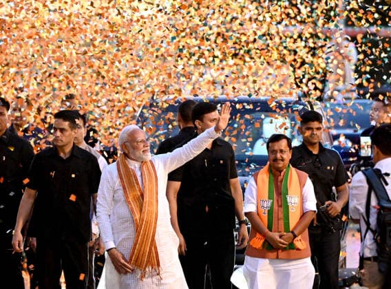 NEW DELHI, INDIA - MAY 4: Prime Minister Narendra Modi with BJP President Nitin Nabin greets supporters as he arrives at the Bharatiya Janata Party (BJP) headquarters to celebrate the BJP win in West Bengal, Assam and Puducherry Assembly election on May 4, 2026 in New Delhi, India. (Photo by Ishant Chauhan Hindustan Times) Prime Minister Narendra Modi Attends Victory Celebrations For West Bengal Assam And Pudduchery Assembly Elections At BJP Headquarters