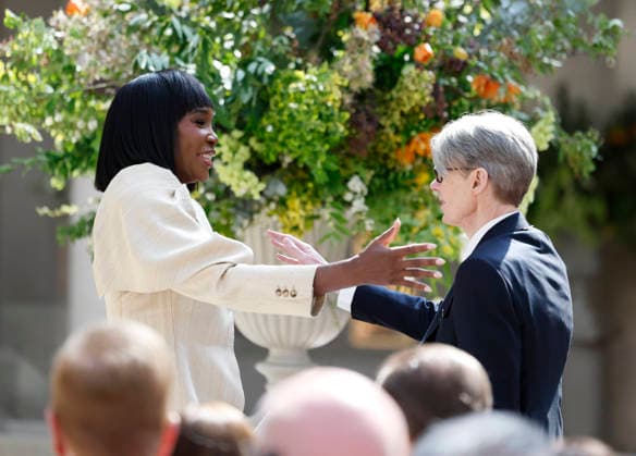 Venus Williams turns the mike over to Curator in Charge Andrew Bolton to deliver remarks at the press preview for the 2026 Met Gala celebrating Costume Art at The Metropolitan Museum of Art on Monday, May 4, 2026 in New York City. Costume Art was curated by Andrew Bolton, Curator in Charge, and The Costume Institute s first exhibition in The Met s new, nearly 12,000-square-foot galleries adjacent to the Great Hall which displays The Costume Institute s annual spring exhibition.  NYP20260504108 JOHNxANGELILLO