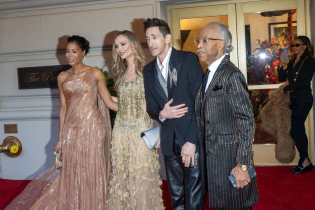 The Pierre Hotel: 2026 Met Gala Departures, New York, USA - 04 May 2026 (L-R) Aisha McShaw, Georgina Chapman, Adrien Brody and Rev. Al Sharpton depart the Pierre Hotel for 2026 Met Gala on May 04, 2026 in New York City. New York United States Copyright: xRonxAdarx xSOPAxImagesx _radar_pierre_20260504_01083