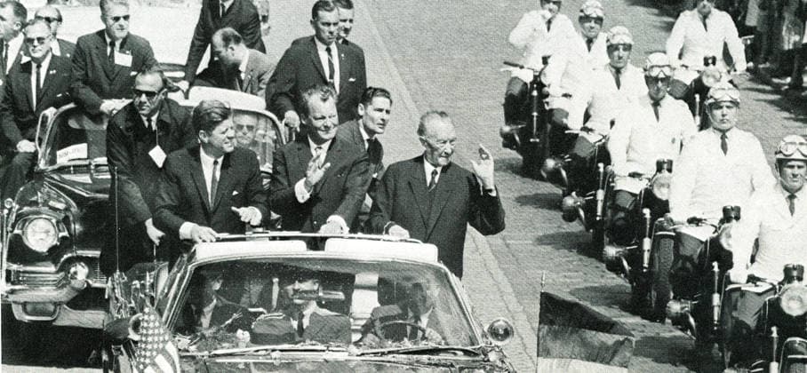 RECORD DATE NOT STATED A photograph of President John F. Kennedy, Willy Brandt, and Konrad Adenauer in a motorcade during Kennedy s historic Berlin visit. A photograph of John F. Kennedy (1917-1963), President of the USA, Willy Brandt (1913-1992), and Konrad Adenauer (1876-1967), Chancellor of West Germany, travelling in an open car in Berlin and acknowledging cheers from the crowd during President Kennedy s visit to the Federal German Republic. This was a key event of the Cold War, where he delivered his famous Ich bin ein Berliner speech, reinforcing transatlantic ties and bolstering morale in West Berlin. 26 June 1963. Editorial use only. All other uses to be cleared with the copyright owner (World History Archive), in advance., WHA_01 Copyright: xx