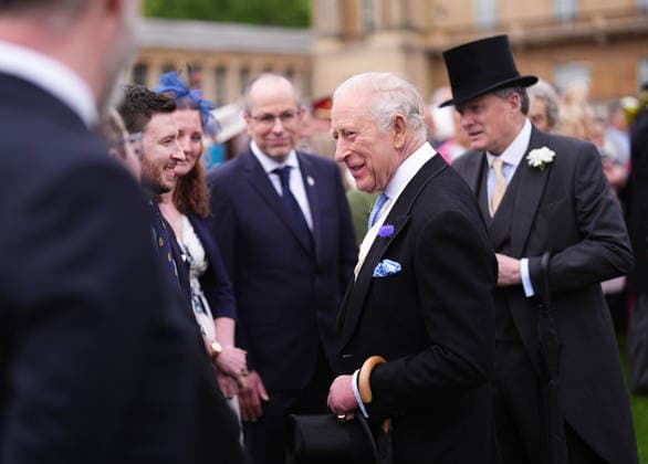 Royal Garden Party at Buckingham Palace King Charles III (centre) talks to guests during a Royal Garden Party at Buckingham Palace, London. Picture date: Wednesday May 6, 2026., Credit:Aaron Chown Avalon UK, London  Copyright: xAaronxChownx xAvalonx 1096939138