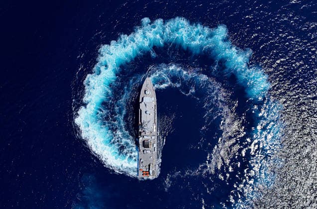 EFES-2026 Exercise in Izmir IZMIR, TURKIYE - MAY 07: An aerial view show Aydin-class mine hunter ship TCG Akcay (M-270) maneuvers in the deep blue sea, creating a large white wake and foam trail during a mine hunting operation as part of the EFES-2026 Exercise in Izmir on May 7, 2026. Conducted by the Turkish Armed Forces (TSK), the tactical exercise involved the detection and successful destruction of maritime mines to ensure safe passage in the region. Berkan Cetin Anadolu Izmir Turkey. Editorial use only. Please get in touch for any other usage.  Copyright: x2026xAnadoluxBerkanxCetinx