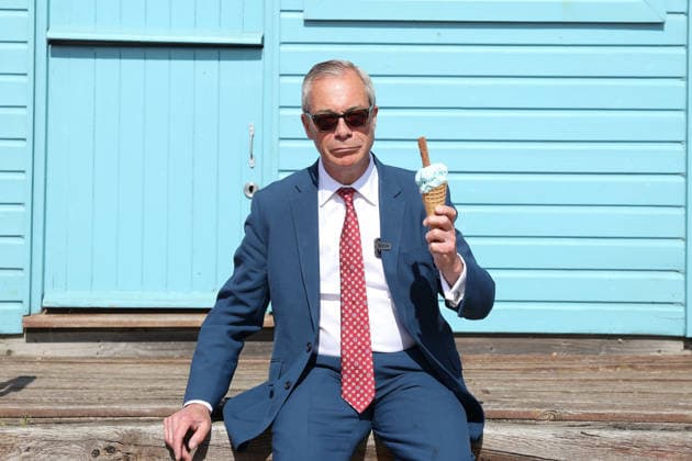 May 7, 2026, Walton-On-The-Naze, Essex, UK: Walton-on-the-Naze, UK. Reform UK leader Nigel Farage, enjoys an ice cream as visits Walton-on-the-Naze, Essex, on the day of local elelctions taking place in England. Walton-On-The-Naze UK  - ZUMAl94_ 20260507_zaf_l94_036 Copyright: xJacquelinexLawriex