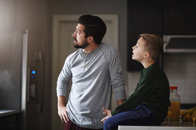 Ill teach you all about this world. a handsome young man and his son in the kitchen at home (License=RF) ,model released, Symbolfoto  Copyright: xZoonar.com KasperxRavlox 20101070 ,model released, Symbolfoto ,property released