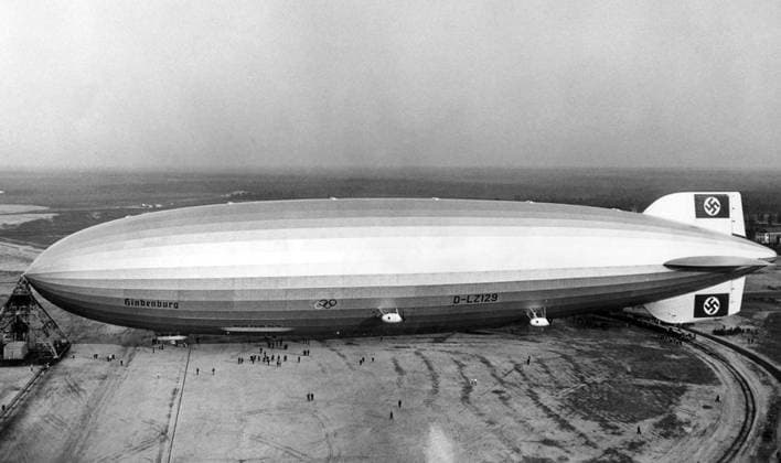 RECORD DATE NOT STATED Photograph of the Hindenburg Photograph of the Hindenburg after a successful landing in Lakehurst, New Jersey. Dated 1936 Editorial use only. All other uses to be cleared with the copyright owner (World History Archive), in advance., WHA_047_0465.jpg, Hindenburg; airship; Lakehurst; New Jersey; 1936; successful landing; historic; transportation; zeppelin; dirigible; vintage; aviation; travel; iconic; disaster; explosion; German; history; famous; landmark; wreckage; fire; tragedy; blimp; aerial; sky; clouds; disaster; crash; flames Copyright: xWorldxHistoryxArchivex