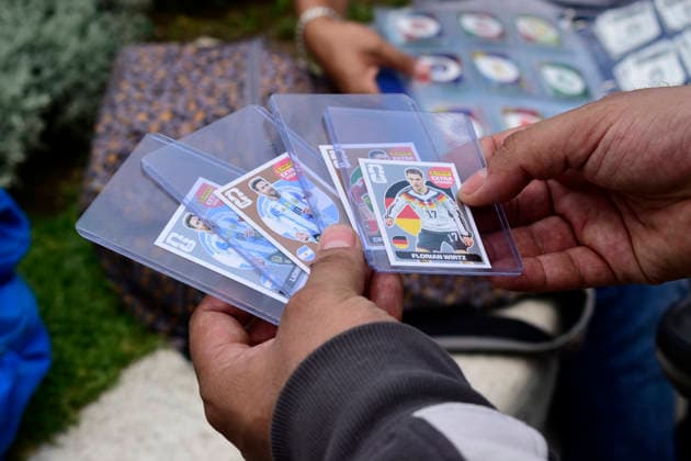 FIFA World Cup Panini Collectible Album Exhibition A Fan shows Panini World Cup collectible cards as part of the FIFA World Cup Panini Collectible Album Exhibition at Palacio de Bellas Artes. on May 9, 2026 in Mexico City, Mexico. (Photo by Luis Barron Eyepix Group) Copyright: xLuisxBarronx xEyepixxGroupx LB_09052026_183543