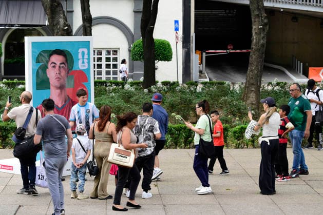 FIFA World Cup Panini Collectible Album Exhibition Fans take photos of a poster of Cristiano Ronaldo during the FIFA World Cup Panini Collectible Album Exhibition on Paseo de la Reforma Avenue.on May 9, 2026 in Mexico City, Mexico. (Photo by Luis Barron Eyepix Group) Copyright: xLuisxBarronx xEyepixxGroupx LB_09052026_183548