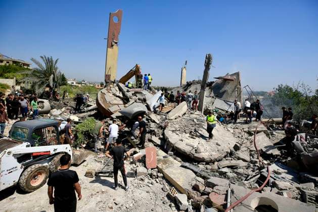 (260510) -- SAKSAKIYEH, May 10, 2026 -- Rescuers search for victims amid the rubble of a residential building after Israeli airstrikes in Saksakiyeh, south Lebanon, May 9, 2026. At least 15 people were killed in a series of Israeli airstrikes in southern Lebanon on Saturday, according to Lebanese official sources. At least one child was among those killed and several children were among those injured in the strikes, according to the Lebanese Health Ministry and the National News Agency. (Photo by Xinhua) LEBANON-SAKSAKIYEH-ISRAELI AIRSTRIKE-AFTERMATH AlixHashisho 