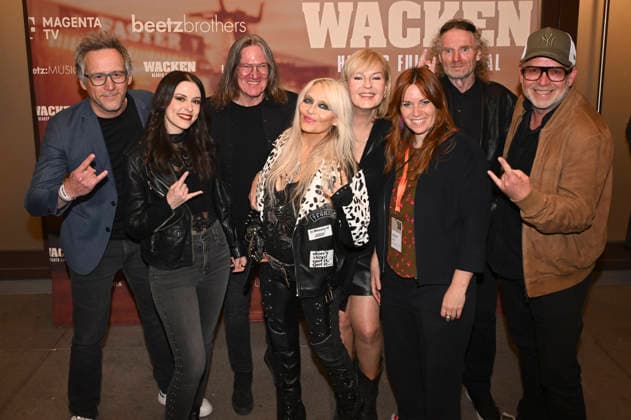 Gast, Jennifer Haben, Thomas Jensen, Doro Pesch, Cordula Kablitz-Post, Adele Kohout, Holger Hübner und Christian Beetz bei der Premiere des Magenta TV-Dokumentarfilms Wacken - Hearts Full of Metal auf dem DOK.fest München 2026 im Deutschen Theater. München, 09.05.2026