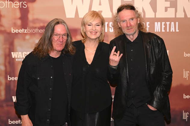 Thomas Jensen, Cordula Kablitz-Post und Holger Hübner bei der Premiere des Magenta TV-Dokumentarfilms Wacken - Hearts Full of Metal auf dem DOK.fest München 2026 im Deutschen Theater. München, 09.05.2026
