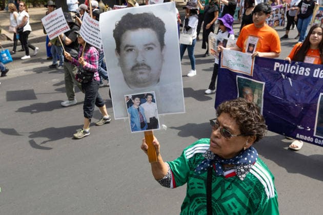 May 10, 2026, Mexico City, Mexico: On Mothers Day, collectives of searching mothers and relatives of missing persons took part in the XIV National Dignity March: Mothers Searching for their Sons, Daughters, Truth and Justice, in Mexico City. The march moved from the Monument to the Mother to the Angel of Independence, where participants demanded answers for missing persons while also protesting against the staging of the 2026 FIFA World Cup amid the countrys disappearance crisis. Mexico City Mexico  - ZUMAl178 20260510_znp_l178_041 Copyright: xCristianxLeyvax