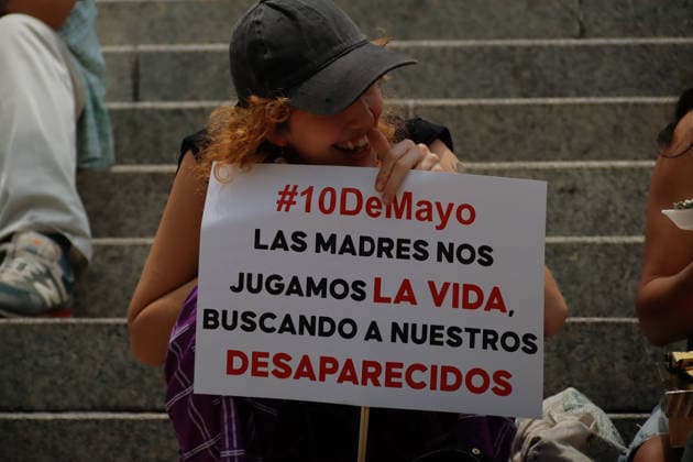 14th National March for Dignity on Mother s Day A woman holds a placard while taking part during a demonstration for the 14th National March for Dignity: Mothers Searching demanding Justice, at the Angel of Independence on the occasion of Mother s Day. on May 10, 2026 in Mexico City, Mexico. (Photo by Carlos Santiago Eyepix Group) Copyright: xCarlosxSantiago xEyepixxGroupx CS_10052026_183572