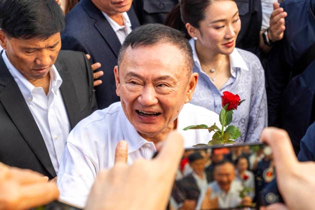 May 11, 2026, Bangkok, Bangkok, Thailand: Former Thai Prime Minister Thaksin Shinawatra smiles shortly after leaving Klong Prem Central Prison after being released on parole in Bangkok, Thailand, on May 11, 2026. Thaksin, who served as prime minister from 2001 until he was ousted in a 2006 military coup, had served two-thirds of a one-year sentence. He was convicted on corruption charges in 2023 and initially sentenced to eight years in prison, a term later reduced to one year by royal pardon. His case sparked renewed controversy after he spent nearly all of his initial detention in a luxury ward at ThailandÃ¢â‚¬â ¢s Police General Hospital before being returned to prison. Bangkok Thailand - ZUMAt128 20260511_zap_t128_001 Copyright: xAdryelxTalamantesx