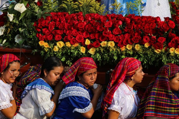 Celebration of the Festival of Flowers and Palms of Panchimalco in El Salvador SAN SALVADOR, EL SALVADOR - MAY 10: Women in indigenous attire carrying an image of the Virgin Mary during the traditional celebration of the Festival of Flowers and Palms in the municipality of Panchimalco, in San Salvador, El Salvador on May 10, 2026. Locals and tourists joined in indigenous brotherhoods to adorn coconut palms with seasonal flowers, to celebrate this traditional Festival of Flowers and Palms, for the first time since its recognition by UNESCO as Intangible Cultural Heritage since December 2025. Alex Pena Anadolu San Salvador El Salvador. Editorial use only. Please get in touch for any other usage.  Copyright: x2026xAnadoluxAlexxPenax