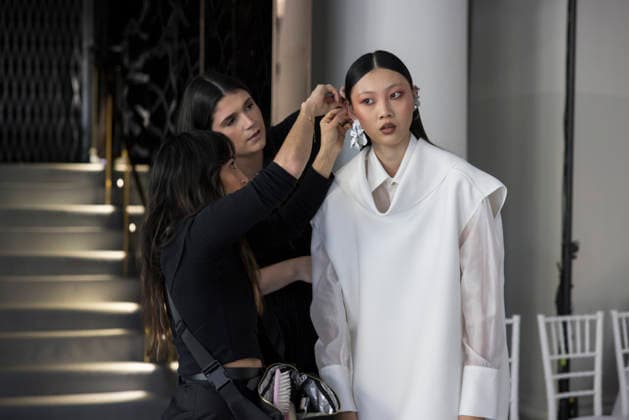 AUSTRALIAN FASHION WEEK, Models prepare backstage ahead of the Toni Maticevski Runway Show during AFC Australian Fashion Week at the Collider, in Sydney, Monday, May 11, 2026. ( NO ARCHIVING SYDNEY NEW SOUTH WALES AUSTRALIA  Copyright: xANNAxKUCERAx 20260511196752150076