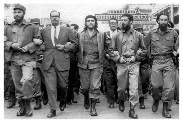 RECORD DATE NOT STATED Photograph of Fidel Castro and Osvaldo Dorticós Fidel Castro Left next to Osvaldo Dorticós (President of Cuba from 1959 until 1976) with Che Guevara at a 1959 parade in Havana. Editorial use only. All other uses to be cleared with the copyright owner (World History Archive), in advance., WHA_061_0027.jpg, Fidel Castro; Osvaldo Dorticós; Che Guevara; 1959 parade; Havana; Cuba; President of Cuba; historical figures; Cuban revolution; political leaders; 1950s; Latin America; communism; socialism; revolutionaries; military parade; iconic image; Cuban history; Cuban government; Cuban politicians; Cuban leaders; Cuban culture; Cuban society; Cuban independence; Cuban nationalism; Cuban heroes; Cuban icons; Cuban flag; Cuban Copyright: xWorldxHistoryxArchivex