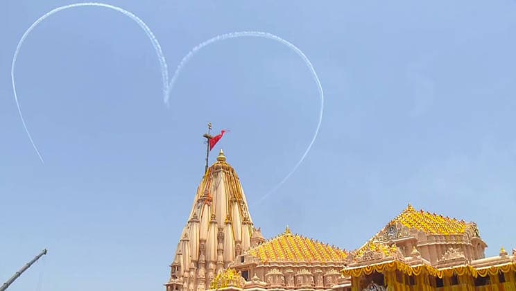 RECORD DATE NOT STATED A view of the Indian Air Force s Surya Kiran Aerobatics team performing manoeuvres on the occasion of Somnath Amrut Mahotsav Gir Somnath, May 11 (ANI): A view of the Indian Air Force s Surya Kiran Aerobatics team performing manoeuvres on the occasion of Somnath Amrut Mahotsav, at Somnath temple, in Gir Somnath on Monday. (DD ANI Video Grab) Gir Somnath Gujarat India Copyright: xANIx ANI_20260511168