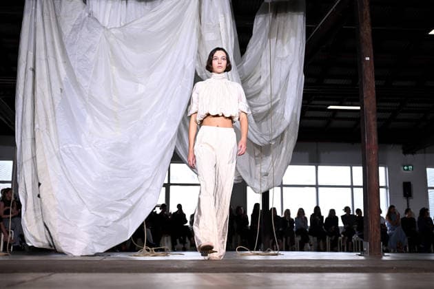 AUSTRALIAN FASHION WEEK, A model walks the runway wearing creations by Australian designer Bianca Spender, during Australian Fashion Week in Sydney, Tuesday, May 12, 2026. ( NO ARCHIVING SYDNEY NEW SOUTH WALES AUSTRALIA  Copyright: xDANxHIMBRECHTSx 20260512183718782978