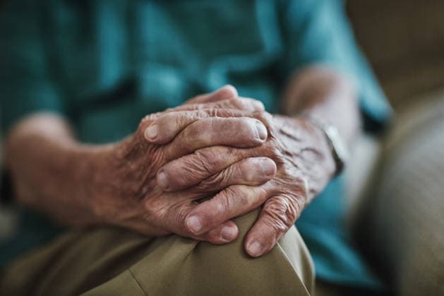 Senior man, hands together and care with support for old age on sofa in retirement home. Closeup of elderly, retired pensioner or male person with pain, grief or loss in recovery or rehab at house. (License=RF) ,model released, Symbolfoto  Copyright: xZoonar.com KasperxRavlox 21847332 ,model released, Symbolfoto ,property released