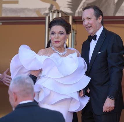 Electric Kiss Premiere at 79th Festival de Cannes - Cannes, France CANNES, FRANCE. May 12, 2026: Joan Collins & Percy Gibson at the Grand Opening and premiere for The Electric Kiss at the 79th Festival de Cannes. Picture: Paul Smith Featureflash Cannes France  Copyright: xPaulxSmithx xFeatureflashx