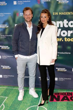 Marc Schlömer und Laura Wontorra beim Premieren-Screening der Magenta TV Doku-Serie Wontorras World Cup - Vater. Tochter. WM. im Telekom Flagship Store. Hamburg, 12.05.2026