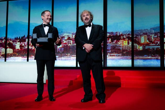 Cannes - Opening Ceremony LZ Elijah Wood and Peter Jackson on stage during the opening ceremony of the 79th annual Cannes Film Festival at Palais des Festivals on May 12, 2026 in Cannes, France. Photo by Laurent Zabulon ABACAPRESS.COM  Copyright: xZabulonxLaurentx