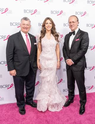 May 12, 2026, Bronx, New York, USA: New York, NY, USA on May 12, 2026: William P. Lauder, Ellizabeth Hurley and Stephane de La Faverie attend BCRF s Hot Pink Party at Glasshouse. Bronx USA - ZUMAr339 20260512_znp_r339_015 Copyright: xLevxRadinx