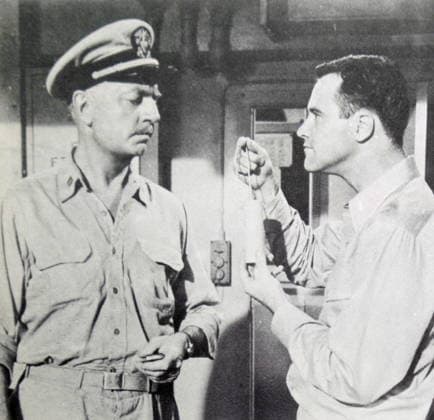 RECORD DATE NOT STATED Film still from Mister Roberts Film still from Mister Roberts starring Jack Lemmon (1925-2001) and William Powell (1892-1984). Dated 20th Century Editorial use only. All other uses to be cleared with the copyright owner (World History Archive), in advance., WHA_086_0933.jpg, Film still; Mister Roberts; Jack Lemmon; William Powell; 20th Century; black and white; actors; Hollywood; classic film; vintage; movie scene; military; navy; comedy; drama; iconic; famous actors; American cinema; 1950s; World War II; sailors; ship; war film; entertainment; cinematic; on-screen chemistry; talented actors; Hollywood legends; film industry; character actors. Copyright: xx