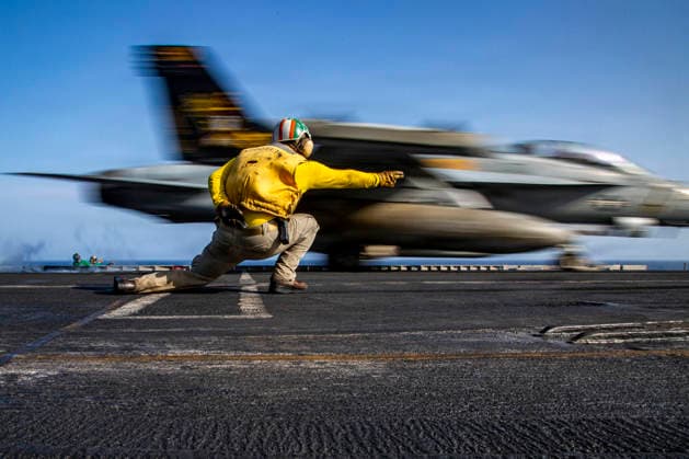 May 13, 2026, Undisclosed Location, United States: A U.S. Navy shooter signals an EA-18G Growler electronic warfare aircraft with the Wizards of Electronic Attack Squadron 133, for launch from the flight deck of the Nimitz-class aircraft carrier USS Abraham Lincoln during Operation Epic Fury and the blockade of Iran, May 10, 2026, on the Arabian Sea. Undisclosed Location United States - ZUMAp138 20260513_zaa_p138_008 Copyright: xUsxNavy U.S.xNavyx