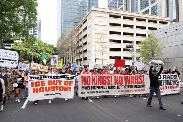 May 13, 2026, Houston, Texas, USA: During a No Kings protest in downtown Houston, gathering demonstrators march and hold up signs. Houston USA  - ZUMA 20260513_mda_g287_003 Copyright: xMatthewxGuzmanx
