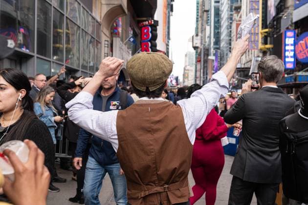 May 13, 2026, Bronx, New York, USA: New York, NY, USA, May 13, 2026: Atmosphere outside of movie theater as actors dressed as paperboys offer fake newspaper ahead of world premiere of Amazon Prime Video s Spider Noir at Regal Times Square. Bronx USA - ZUMAr339 20260513_znp_r339_001 Copyright: xLevxRadinx