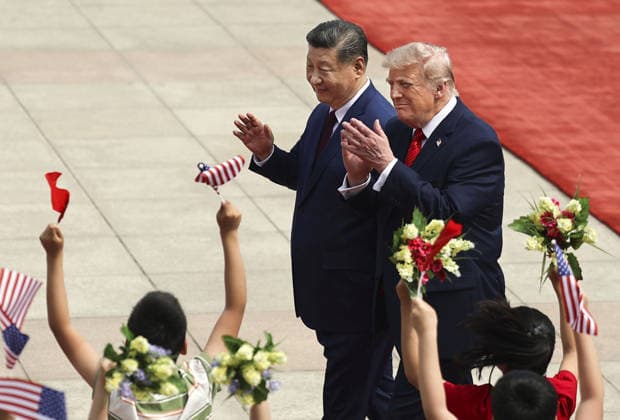 U.S. President Trump in Beijing U.S. President Donald Trump (R), alongside Chinese President Xi Jinping, attends a welcoming ceremony at the Great Hall of the People in Beijing on May 14, 2026.  A14AA0005554840P