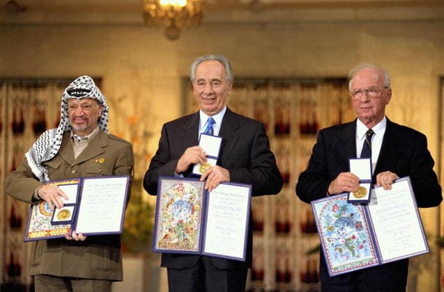 RECORD DATE NOT STATED The Nobel Peace Prize laureates for 1994 in Oslo. Yasser Arafat, Shimon Peres, Yitzhak Rabin The Nobel Peace Prize laureates for 1994 in Oslo. From left to right: PLO Chairman Yasser Arafat, Israeli Foreign Minister Shimon Peres, Israeli Prime Minister Yitzhak Rabin Editorial use only. All other uses to be cleared with the copyright owner (World History Archive), in advance., WHA_096_0725.jpg, Nobel Peace Prize; laureates; 1994; Oslo; PLO Chairman; Yasser Arafat; Israeli Foreign Minister; Shimon Peres; Israeli Prime Minister; Yitzhak Rabin; peace; Middle East; conflict resolution; historic moment; handshake; unity; cooperation; diplomacy; leaders; political figures; Nobel laureates; Oslo Accords; peace process; reconc Copyright: xWorldxHistoryxArchivex