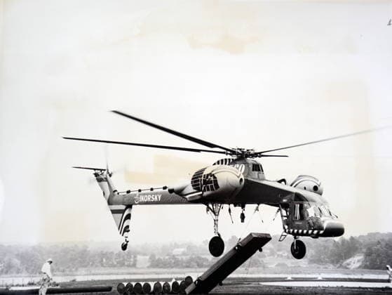 RECORD DATE NOT STATED Photograph of a Sikorsky S-64 Skycrane Photograph of a Sikorsky S-64 Skycrane, an American twin-engine heavy-lift helicopter. Dated 20th Century Editorial use only. All other uses to be cleared with the copyright owner (World History Archive), in advance., WHA_097_0690.jpg, Sikorsky S-64 Skycrane; heavy-lift helicopter; American helicopter; twin-engine helicopter; Sikorsky aircraft; aviation; transportation; aerial crane; heavy lifting; helicopter industry; 20th century technology; military helicopter; commercial helicopter; air transport; heavy cargo; helicopter design; helicopter engineering; helicopter innovation; helicopter history; Sikorsky legacy; helicopter manufacturing; helicopter production; helicopter proto Copyright: xWorldxHistoryxArchivex