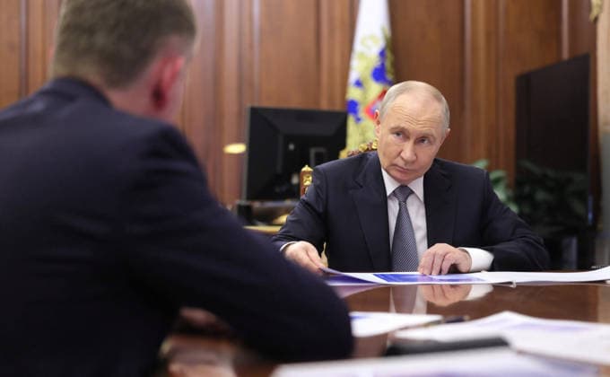 May 14, 2026, Moscow, Moscow Oblast, Russia: Russian President Vladimir Putin, listens to Minister of Economic Development Maxim Reshetnikov, left, deliver his report during a face-to-face meeting at the Kremlin, May 12, 2026 in Moscow, Russia. Moscow Russia - ZUMAp138 20260514_zaa_p138_006 Copyright: xMikhailxMetzel RussianxGovernmenx