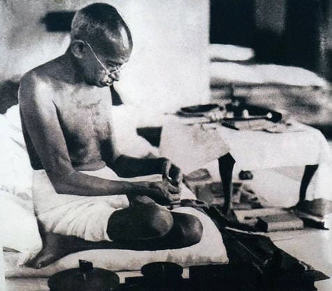 RECORD DATE NOT STATED Mahatma Gandhi spinning homespun cloth during a protest against British Rule in India. Mahatma Gandhi spinning homespun cloth during a protest against British Rule in India. Mohandas Karamchand Gandhi (1869 ? 1948), Gandhi was the preeminent leader of the Indian independence movement in British-ruled India. At 5:17 pm on 30 January 1948, Editorial use only. All other uses to be cleared with the copyright owner (World History Archive), in advance., WHA_100_0459.jpg, Mahatma Gandhi; spinning; homespun cloth; protest; British Rule; India; Mohandas Karamchand Gandhi; leader; independence movement; British-ruled India; 30 January 1948; nonviolent resistance; civil disobedience; Indian history; political activism; social ju Copyright: xx