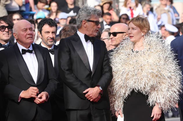 Hanns Zischler, Sandra Hüller und August Diehl bei der Premiere des Kinofilms Fatherland auf dem Festival de Cannes 2026 79. Internationale Filmfestspiele von Cannes im Palais des Festivals. Cannes, 14.05.206