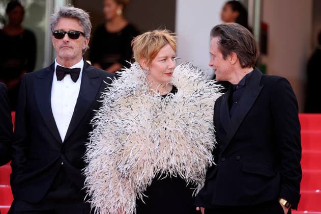 Pawel Pawlikowski, Sandra Hüller und August Diehl bei der Premiere des Kinofilms Fatherland auf dem Festival de Cannes 2026 79. Internationale Filmfestspiele von Cannes im Palais des Festivals. Cannes, 14.05.206
