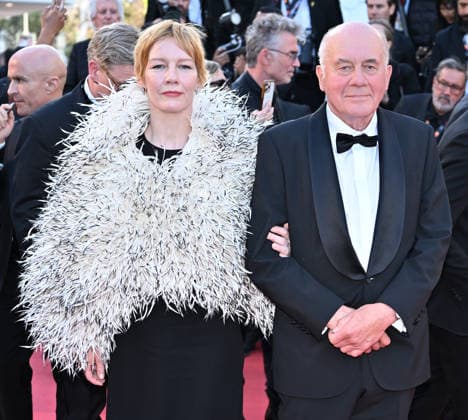 79th Cannes Film Festival: Fatherland screening CANNES, FRANCE - MAY 14: German actress Sandra Huller (L) and German actor Hanns Zischler (R) leave after the screening of the film Fatherland at the 79th edition of the Cannes Film Festival in Cannes, France on May 14, 2026. Mustafa Yalcin Anadolu Cannes France. Editorial use only. Please get in touch for any other usage.  Copyright: x2026xAnadoluxMustafaxYalcinx
