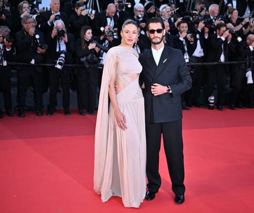 79th Cannes Film Festival: Histoires Paralleles (Parallel Tales) screening CANNES, FRANCE - MAY 14: French actor Pierre Niney (R) and his partner Australian actress Natasha Andrews (L) arrive for the screening of the film Histoires Paralleles (Parallel Tales) at the 79th edition of the Cannes Film Festival in Cannes, France on May 14, 2026. Mustafa Yalcin Anadolu Cannes France. Editorial use only. Please get in touch for any other usage.  Copyright: x2026xAnadoluxMustafaxYalcinx