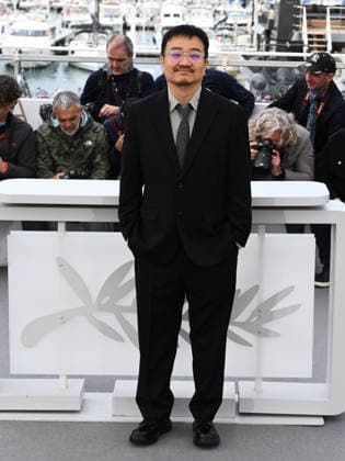 IPA84714730 - Cannes, 79th Cannes Film Festival 2026, day 4 - photocall of Gun-Che (Colony). Pictured: Yeon Sang-ho  Copyright: xAlbertoxTerenghix xPoolxPhotoxEventsx07x 84714730