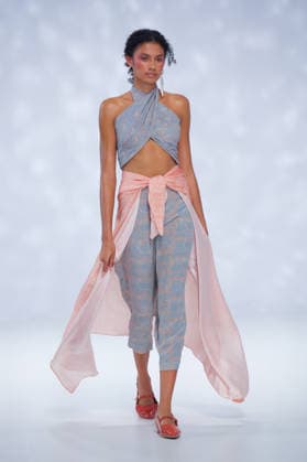Australian Fashion Week 2026 - Runway - Ngali A model walks the runway during the Ngali Wander with Wonder Runway show at Australian Fashion Week 2026 at the Museum of Contemporary Art on May 15, 2026 in Sydney, Australia., Credit:IOIO IMAGES IOIO Avalon Australia, New South Wales, Sydney, Museum of Contemporary Art  Copyright: xIOIOxIMAGESx xIOIOx xAvalonx 1099145470