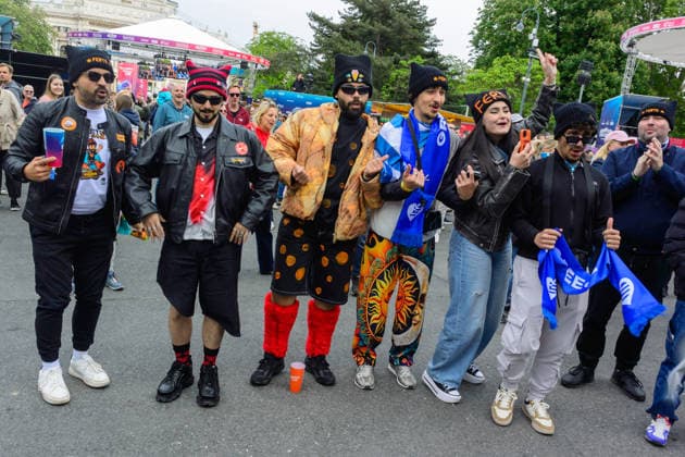 vienna, austria, 15 may 2026, esc village in front of the city hall, eurovision song contest, greek fans with costumes in front of the stage