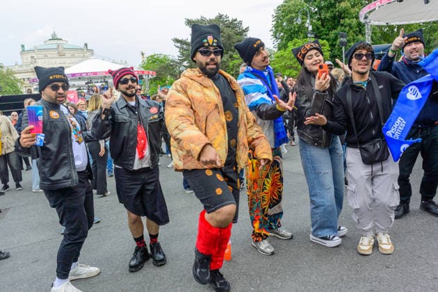 vienna, austria, 15 may 2026, esc village in front of the city hall, eurovision song contest, greek fans with costumes in front of the stage