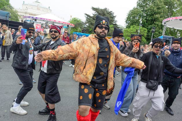 vienna, austria, 15 may 2026, esc village in front of the city hall, eurovision song contest, greek fans with costumes in front of the stage