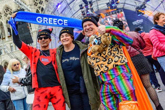 vienna, austria, 15 may 2026, esc village in front of the city hall, eurovision song contest, greek fans with costumes in front of the stage