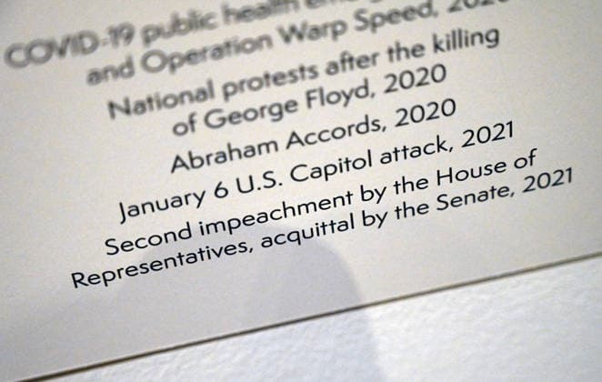 President Trump s portrait on display with references to his two impeachments restored in the exhibit text at the Smithsonian s National Portrait Gallery President Trump s portrait is on display with references to his two impeachments restored in the exhibit text at the Smithsonian s National Portrait Gallery in Washington, D.C. on May 15, 2026. Earlier in the year, the gallery had replaced the original presidential portrait with an image preferred by Trump and removed wall text mentioning both his impeachments and the January 6 Capitol attack, prompting criticism and debate over historical presentation. Photo by Olivier Douliery ABACAPRESS.COM Washington DC United States  Copyright: xDoulieryxOlivier ABACAx