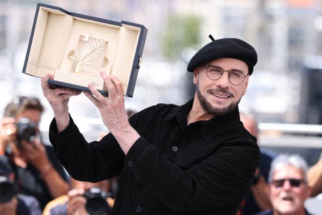 Cannes - Propeller One-Way Night Coach Photocall JD John Travolta attending the Propeller One-Way Night Coach photocall during the 79th annual Cannes Film Festival at Palais des Festivals on May 16, 2026 in Cannes, France. Photo by Jerome Domine ABACAPRESS.COM Cannes France  Copyright: xDominexJerome ABACAx