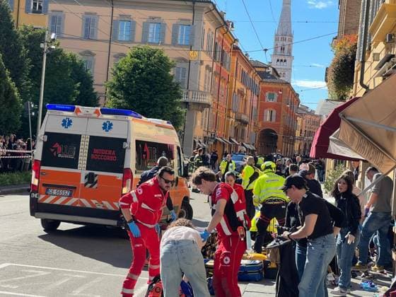 May 16, 2026, Modena: Law enforcement and emergency workers respond after a car plowed into a dozen pedestrians in downtown Modena, Italy, May 16, 2026. Some people were injured, some seriously. ANSA FRANCESCO VECCHI Modena  - ZUMAa110 20260516_zaf_a110_034 Copyright: xFrancescoxVecchix